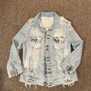 Acquaverde jean jacket with holes in a light jean color